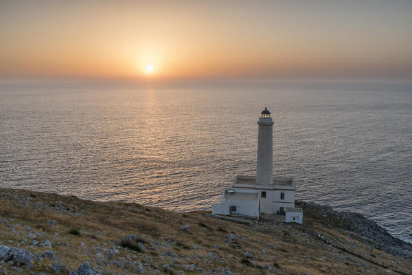 Otranto, province of Lecce, Salento, Apulia, Italy. Sunrise at the lighthouse Faro della Palascìa. This lighthouse marks the most easterly point of the Italian mainland.