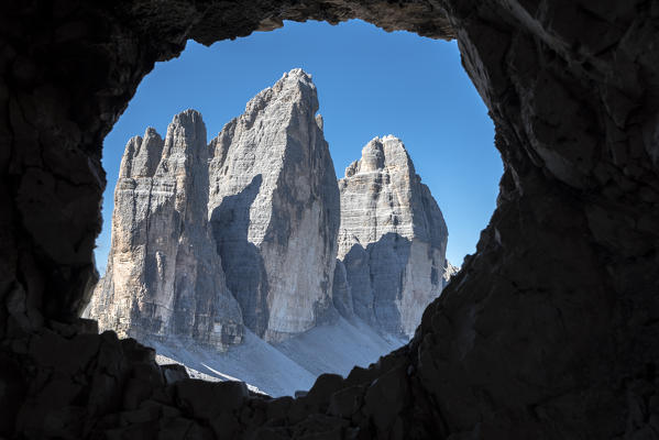 Sesto/Sexten, Dolomites, South Tyrol, province of Bolzano, Italy. The Tre Cime di Lavaredo/Drei Zinnen through a rock window from the First World War