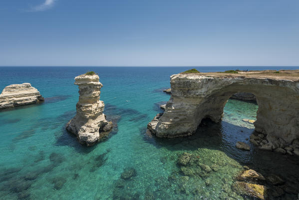 Melendugno, province of Lecce, Salento, Apulia, Italy. The Faraglioni in Torre Sant'Andrea