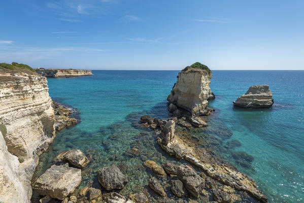 Melendugno, province of Lecce, Salento, Apulia, Italy. The Faraglioni in Torre Sant'Andrea