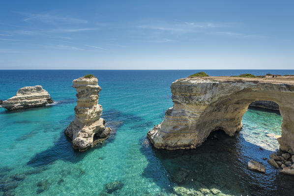 Melendugno, province of Lecce, Salento, Apulia, Italy. The Faraglioni in Torre Sant'Andrea