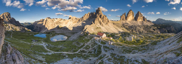 Sesto / Sexten, province of Bolzano, Dolomites, South Tyrol, Italy. Sunset at the Tre Cime di Lavaredo, lakes Piani, Mount Paterno and refuge Locatelli