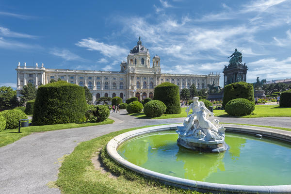 Vienna, Austria, Europe. Tritons and Naiads fountain on the Maria Theresa square with the Art History Museum in the background