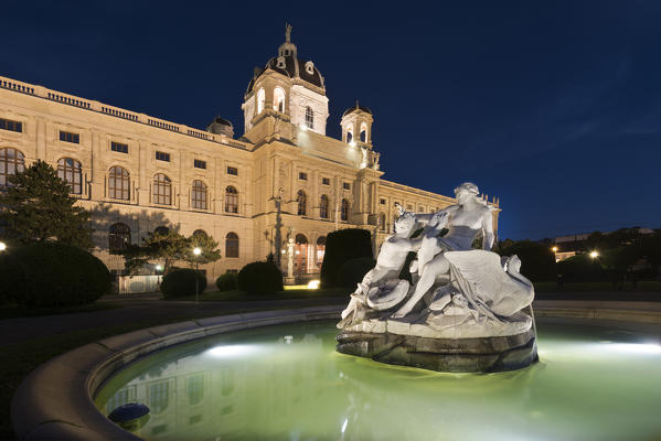 Vienna, Austria, Europe. Tritons and Naiads fountain on the Maria Theresa square with the Art History Museum in the background
