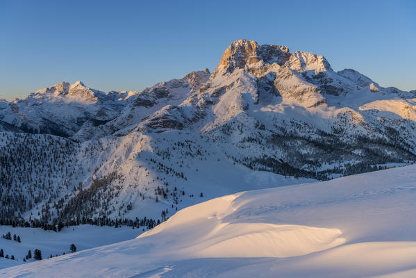 Prato Piazza/Plätzwiese, Dolomites, province of Bolzano, South Tyrol, Italy. Sunrise an the Prato Piazza with the peaks of the Tofane and the Croda Rossa d' Ampezzo