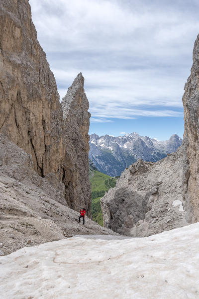 Misurina, Cadini mountains, Dolomites, province of Belluno, Veneto, Italy. A mountaineer on the mountain trail 