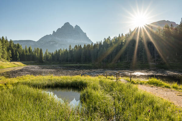 Misurina, Dolomites, province of Belluno, Veneto, Italy. The lake Antorno with Tre Cime in the background