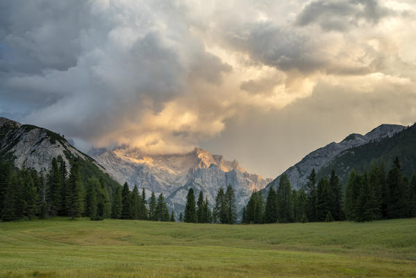 Prato Piazza/Plätzwiese, Dolomites, South Tyrol, Italy. 
Storm cloud over the Cristallo massiv at sunset