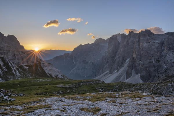 Sesto / Sexten, province of Bolzano, Dolomites, South Tyrol, Italy. The sun rises over the Altensteiner valley