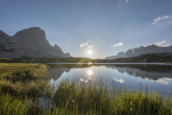 Sesto / Sexten, province of Bolzano, Dolomites, South Tyrol, Italy. Sunrise at the lake Piani
