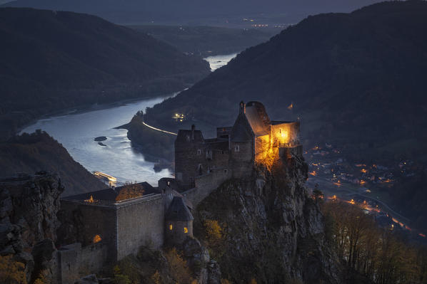 Schoenbühel-Aggsbach, Wachau, district of Melk, Lower Austria, Austria, Europe. The castle ruins of Aggstein at dusk