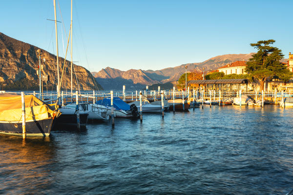 Sunset in the small pier of Iseo, Brescia province, Iseo lake in Lombardy district, Italy.
