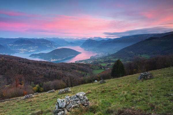 Iseo lake at dawn panoramic view, Lombardy district, Brescia province, Italy.