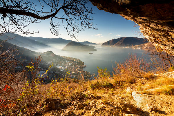 The iseo lake seen from a natural cave, Lombardy district, Brescia province, Italy.