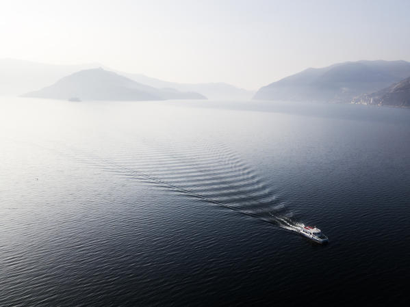Boat in the middle of Iseo lake, Lombardy district, Brescia province, Italy, Europe