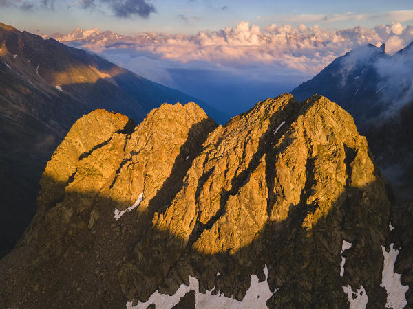 Aerial view at sun over Canè Valley, Brescia province, Italy, Europe.