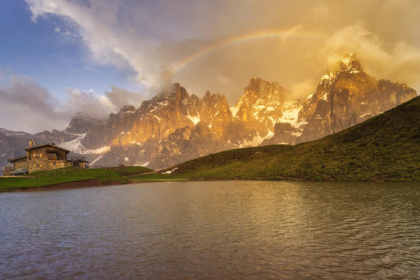 Baita Segantini and Pale di San Martino at sunset in Dolomiti, Trento province, Trentino Alto Adige, Italy, Europe.