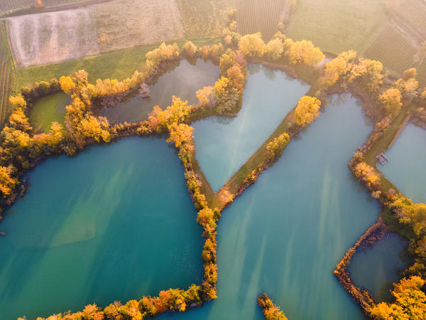 Sunset over Franciacorta and Torbiere del Sebino natural reserve, Brescia province in Italy, Lombardy, Europe.