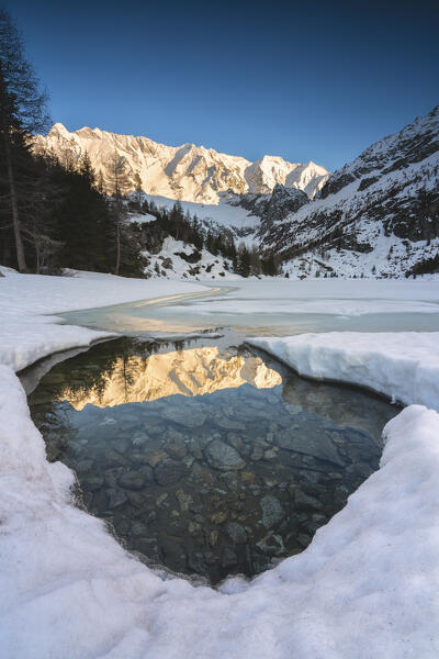 Alpine lakes at thaw in winter season, Brescia province in Lombardy district, Italy, Europe.