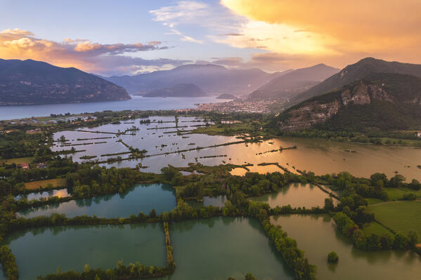 Sunset over Franciacorta and Torbiere del Sebino natural reserve, Brescia province in Lombardy district, Italy.