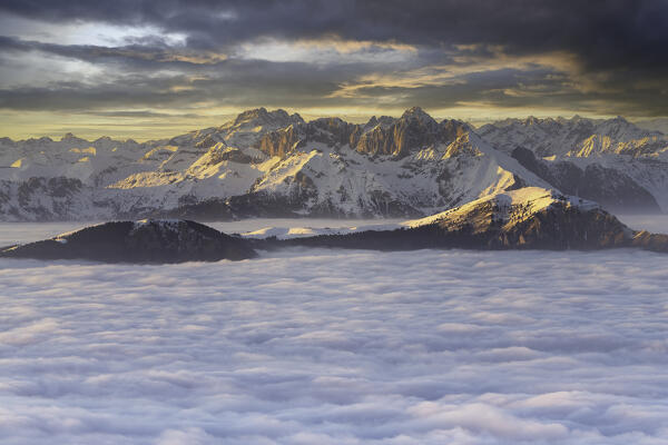 Presolana during sunset above the clouds, Bergamo province in Lombardy district, Italy, Europe.