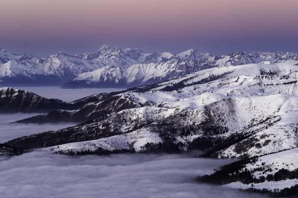 Camonica Valley and Adamello Group photographed from Monte Guglielmo in a winter sunset, Brescia province in Lombardy district, Italy, Europe.