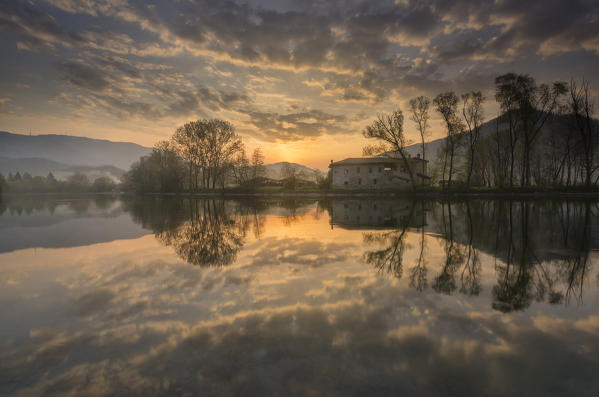 Sunrise in Adda river, Airuno, province of Lecco, Italy.
