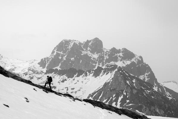 Hiker in Adamello Park,province of Brescia, Italy.