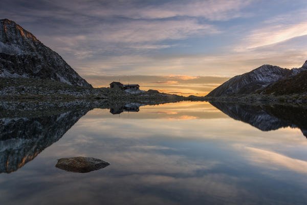 Sunset in Adamello park, Tonolini refuge, province of Brescia, Italy.