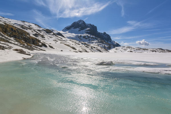 Europe, Italy, thaw at vacca Lake, Adamello park, province of Brescia.