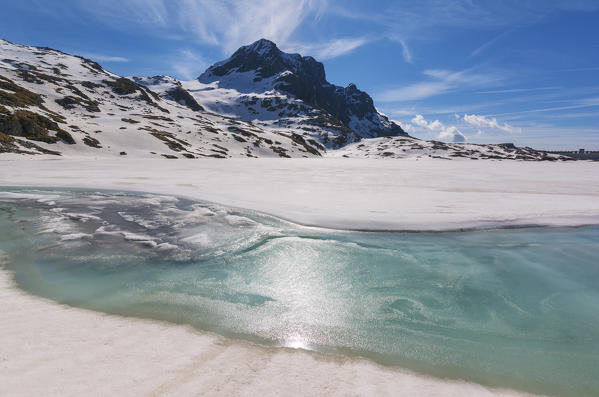 Europe, Italy, thaw at vacca Lake, Adamello park, province of Brescia.