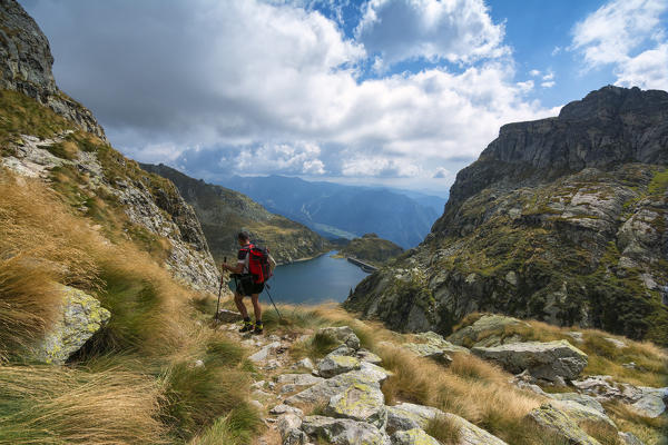 Europe, Italy, hiker in Orobie alps, province of Bergamo.