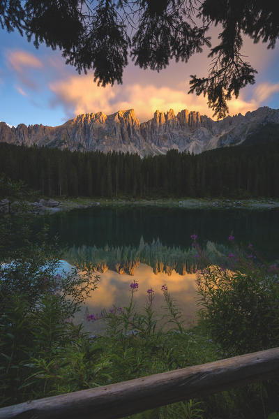 Carezza lake at sunset, Bolzano province, Trentino Alto Adige, Italy.