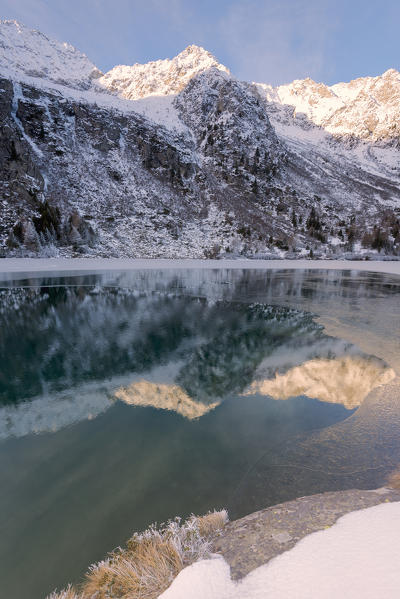 Reflections in Aviolo lake, Adamello park, Brescia province, Lombardy district, Italy, Europe.