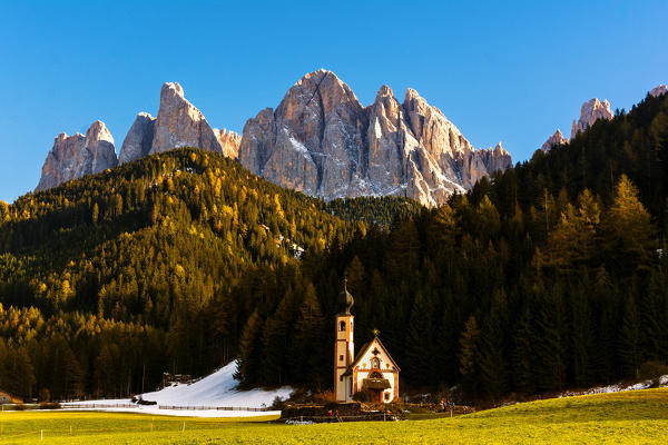 San Giovanni in Ranui at Sunset in Funes valley, Odle Natural park in Trentino Alto Adige district, Italy, Bolzano province, Europe.