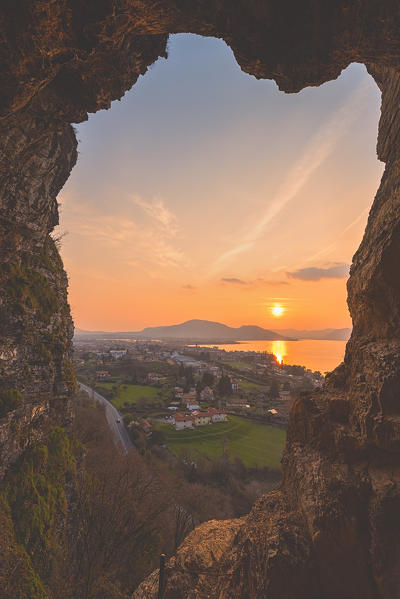 Iseo seen from a cave at sunset, Iseo lake, Lombardy district, Brescia province, Italy.