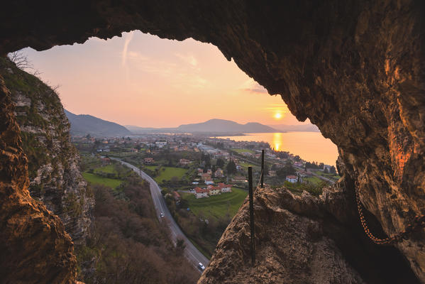 Iseo seen from a cave at sunset, Iseo lake, Lombardy district, Brescia province, Italy.