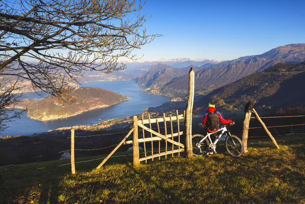 Mountain bike over iseo lake, Lombardy district, Brescia province, Italy