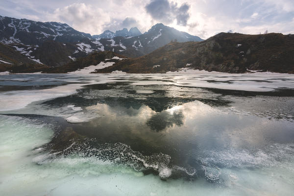 Seroti lake at thaw in Stelvio national park, Lombardy district, Brescia province Italy.