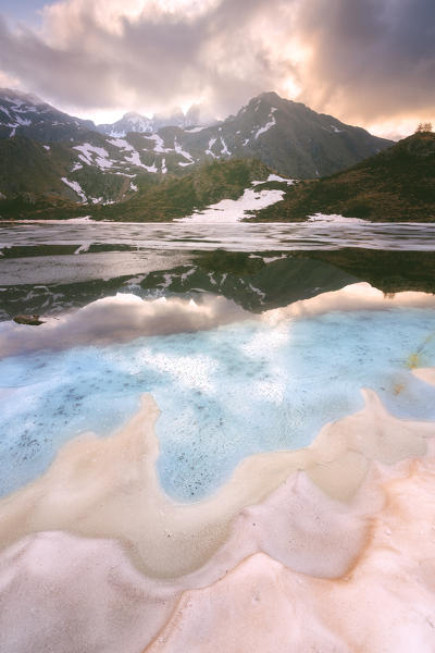 Seroti lake at thaw in Stelvio national park, Lombardy district, Brescia province Italy.