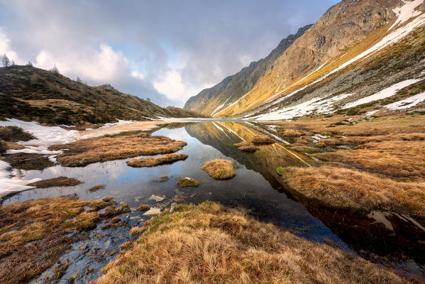 Seroti lake at thaw in Stelvio national park, Lombardy district, Brescia province Italy.