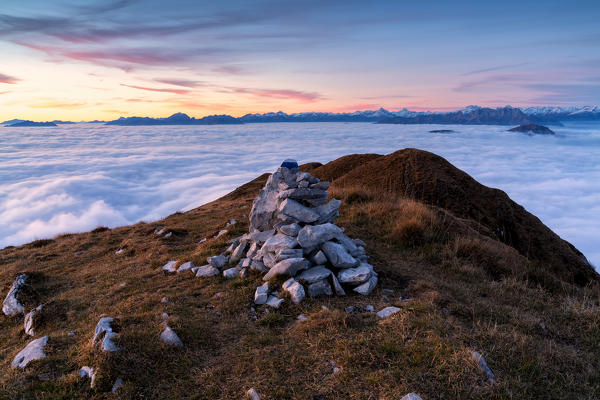 Stone men at Sunset from Mount Guglielmo above the Clouds, Brescia province, Lombardy district, Italy