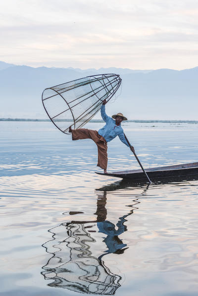 Inle lake, Nyaungshwe township, Taunggyi district, Myanmar (Burma). Local fisherman with typical conic fishing net.