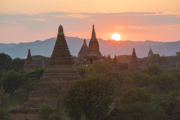 Bagan, Mandalay region, Myanmar (Burma). Stupas at sunset.
