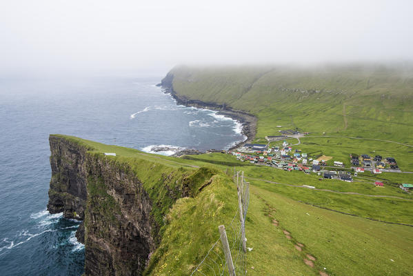 Gjogv, Eysturoy island, Faroe Islands, Denmark. Village seen from the top of the cliffs.