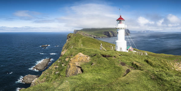 Mykines island, Faroe Islands, Denmark. Lighthouse and cliffs.
