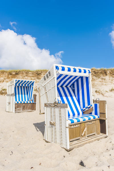 Hörnum, Sylt island, North Frisia, Schleswig-Holstein, Germany.  Strandkorbs on the beach.