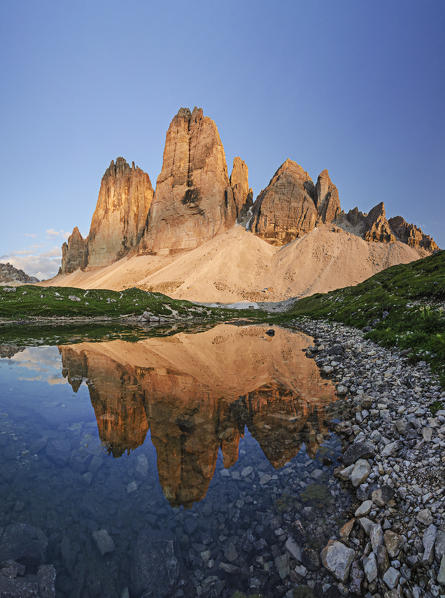 Tre Cime di Lavaredo, Drei Zinnen, Three peaks of Lavaredo, Dolomites, South Tyrol, Veneto, Italy. Tre Cime di Lavaredo  are reflected in Grava Longia's lake