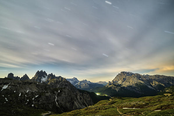 Three Peaks Of Lavaredo, Sesto Dolomites, Veneto, Italy. Star trail over the Cristallo Mount
