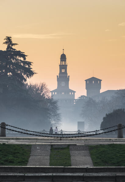 Milan, Lombardy, Italy. The Castello Sforzesco during a foggy morning.